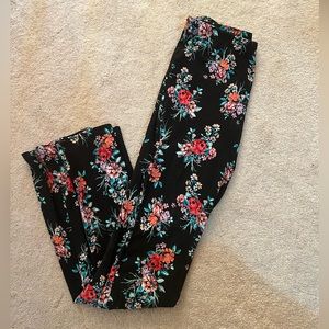 Brand: no comment/ size: medium/ color:black with pink, orange, & purple flowers